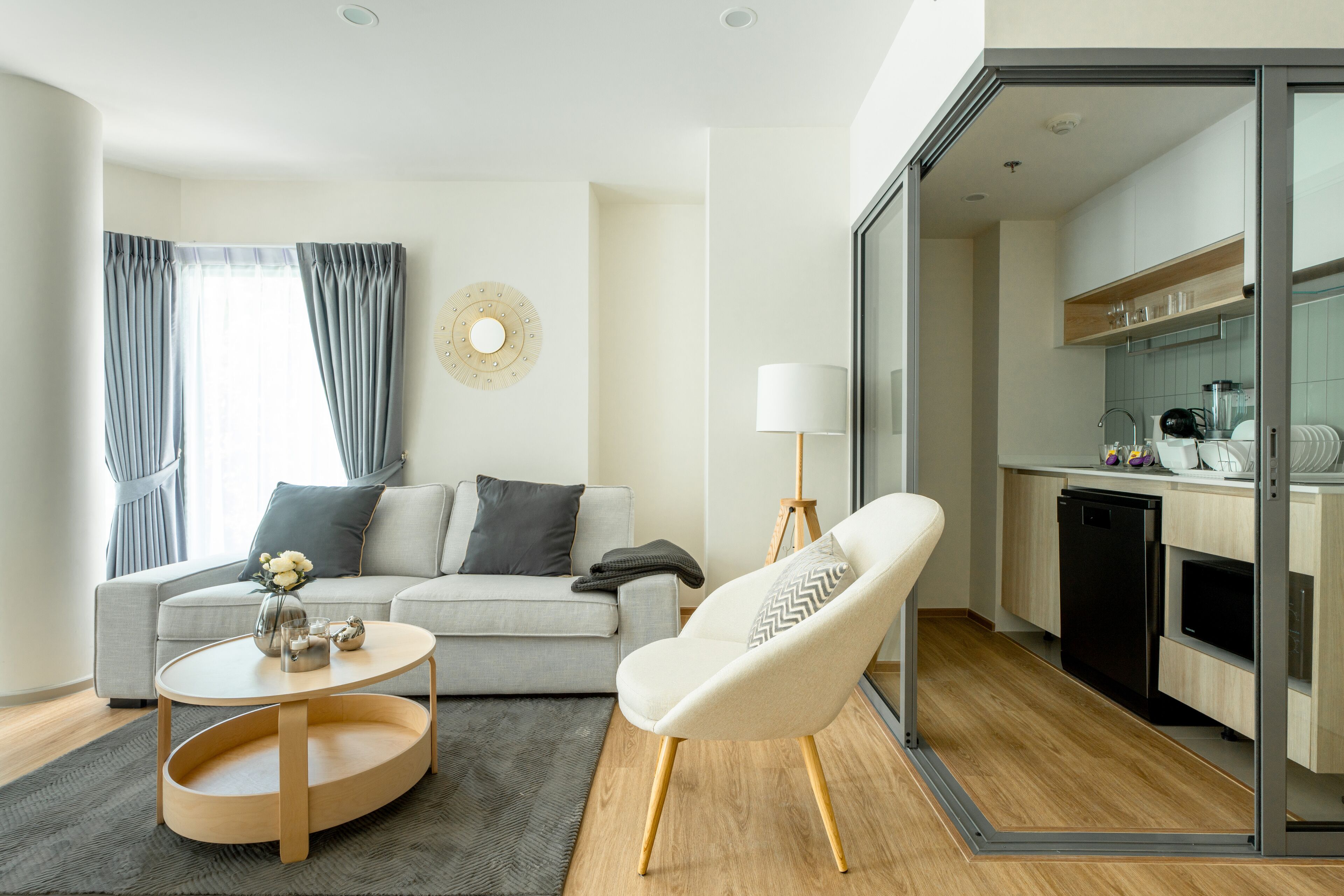 Business Apartment, Balcony, Pool View | Living area