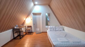 Chambre Confort avec lits jumeaux | Coin séjour