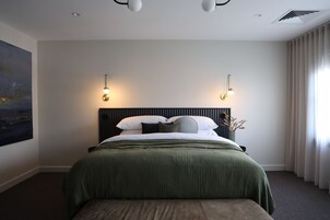 Habitación ejecutiva doble | Ropa de cama de alta calidad y colchones con acolchado adicional