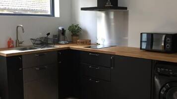 Fridge, microwave, stovetop, coffee/tea maker