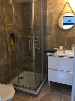 Hair dryer, towels, soap, shampoo