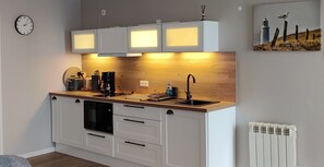 Réfrigérateur, four, plaque de cuisson, lave-vaisselle