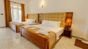 Deluxe Room, 1 Bedroom | Iron/ironing board, free WiFi