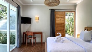 A hotel room with a bed, a desk, a chair, a television, and a large window. - MaySa Villa Uluwatu (Pecatu)