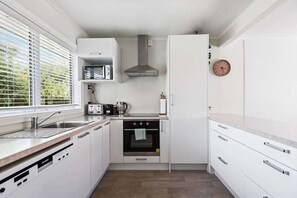 Fridge, microwave, oven, stovetop - Home Base | Central Location with Spa Pool (Rotorua)