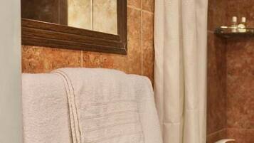 Deluxe Double Room | Bathroom | Shower, designer toiletries, towels, soap