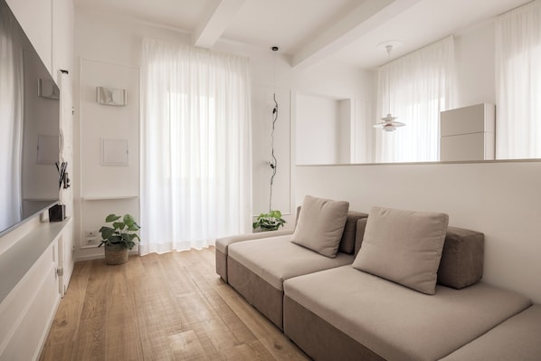 Design-Apartment | Wohnbereich | 40-Zoll-Flachbildfernseher mit Digitalempfang