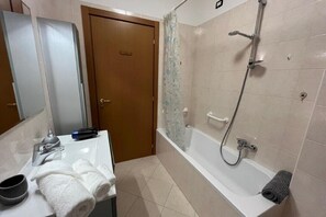 Hair dryer, bidet, towels, soap