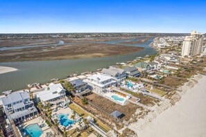 A coastal hotel with multiple swimming pools, beachfront access, and a view of the river. - Kinlaw's Quarters- Ocean Isle Beach (Ocean Isle Beach)