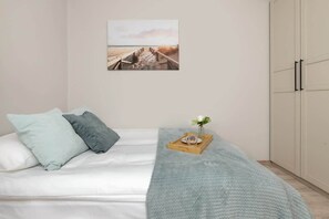 1 habitación, tabla de planchar con plancha, wifi y ropa de cama 