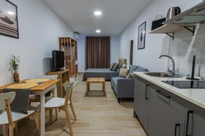 Deluxe Apartment, 1 Double Bed with Sofa bed, Terrace, Partial Ocean View | Living area | Flat-screen TV - Apartamentos turisticos Jose Cruz  (Nerja)