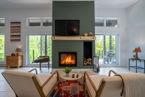 TV, fireplace, books, offices