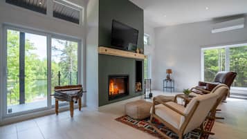 TV, fireplace, books, offices