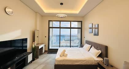 Upscale Apartment at Oval Tower Near Downtown with Balcony and Parking by Belvilla