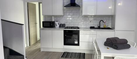 Apartment | Private kitchen | Fridge, microwave, oven, stovetop