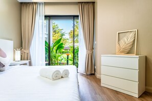 Executive Apartment, 2 Bedrooms, Golf View | In-room safe, blackout curtains, iron/ironing board, free WiFi - Allamanda Residences by NLA (Choeng Thale)