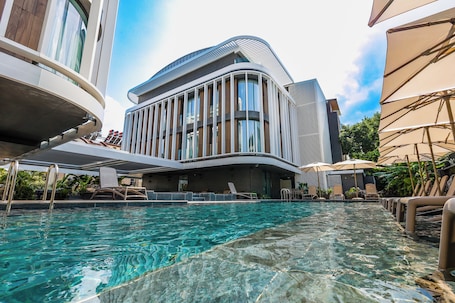 Outdoor pool, open 8:00 AM to 8:00 PM, pool umbrellas, sun loungers