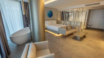 Quarto lua de mel, 1 cama King, vista parcial para o mar | Roupas de cama premium, frigobar, cofres nos quartos