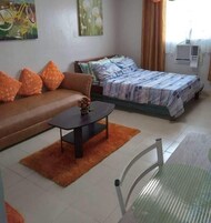 Comfort Condo, 1 Bedroom, Kitchen, Ocean View | Living area | 32-inch Smart TV with digital channels, Netflix, streaming services