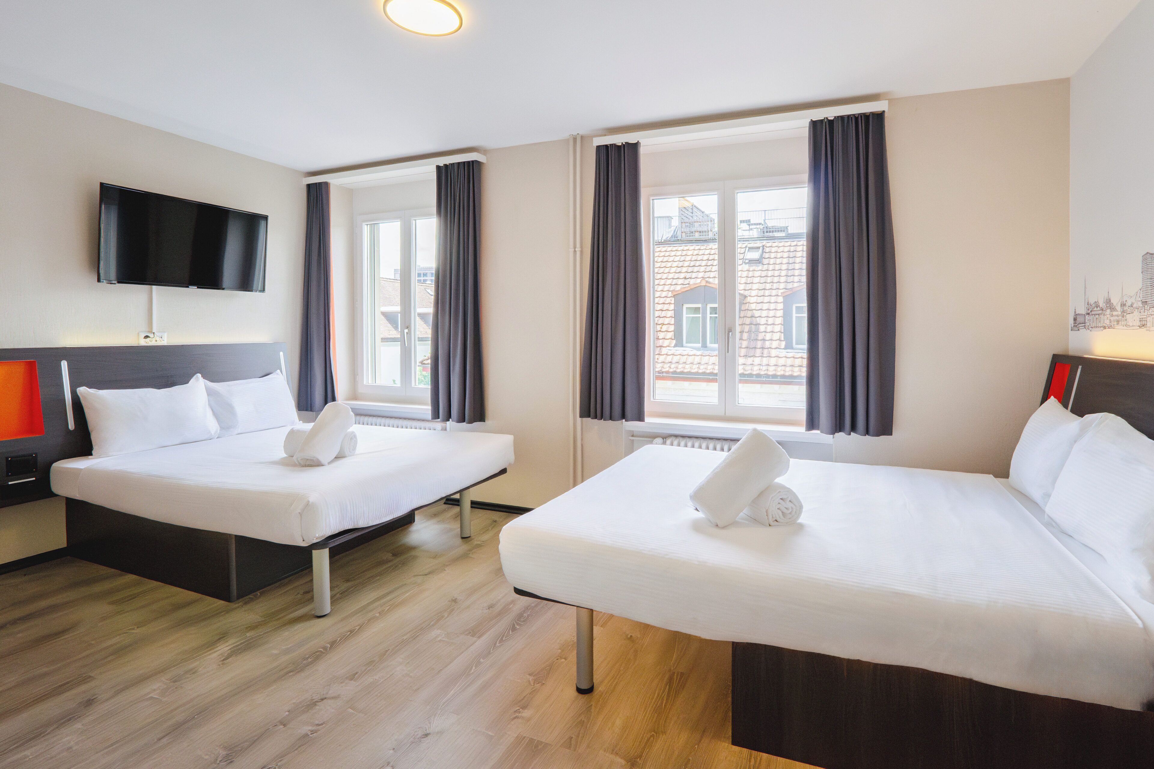 Basic Twin Room | Desk, laptop workspace, free WiFi, bed sheets