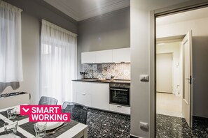 Fridge, oven, electric kettle, cookware/dishes/utensils