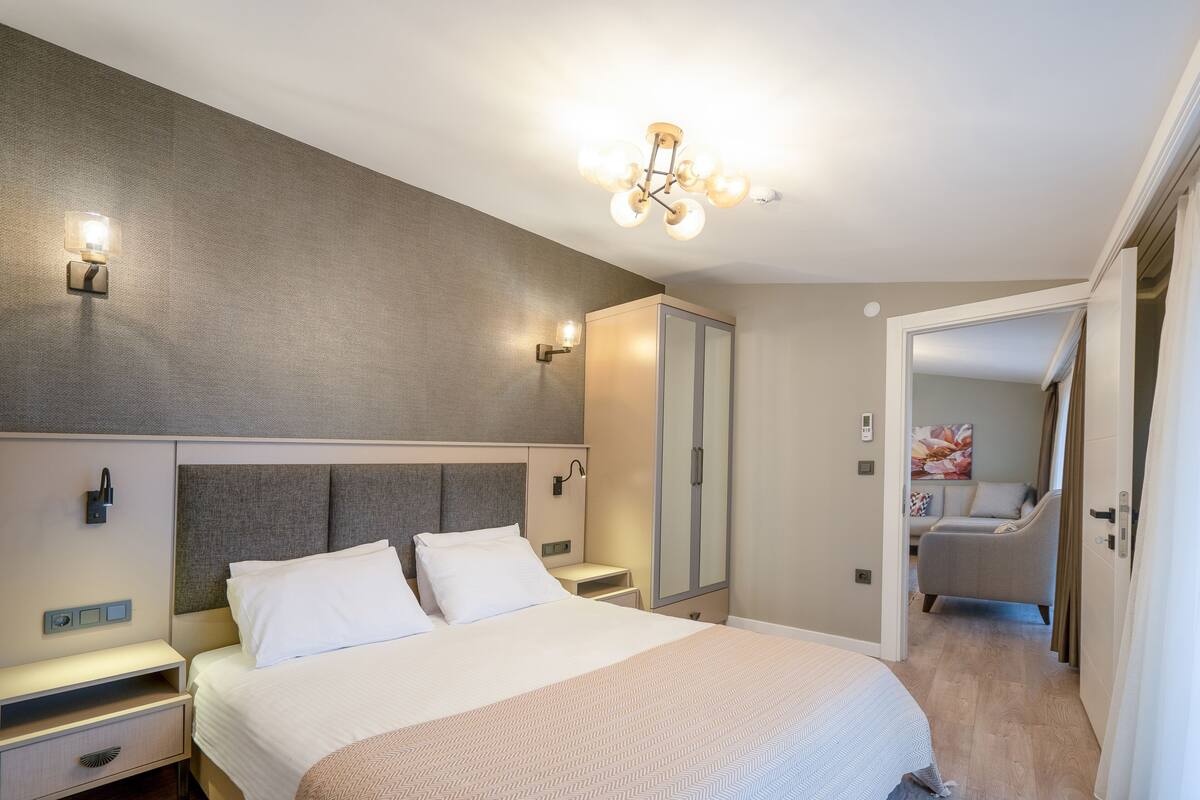 Panoramic Suite | 1 bedroom, premium bedding, memory foam beds, in-room safe