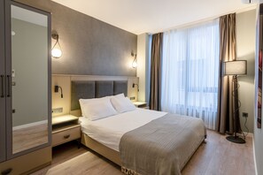 家庭套房 | 高档床上用品、记忆海绵床垫、客房内保险箱、特色装修