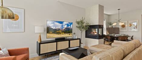 Smart TV, fireplace, books, offices