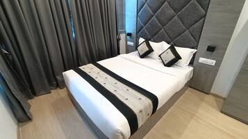Deluxe Room | Egyptian cotton sheets, premium bedding, memory-foam beds
