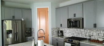 Family home in Beachwalk with roomy common areas and private spaces for a group.