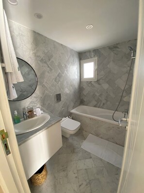 Premium Double Room, Mountain View | Bathroom | Rainfall showerhead, hair dryer, towels
