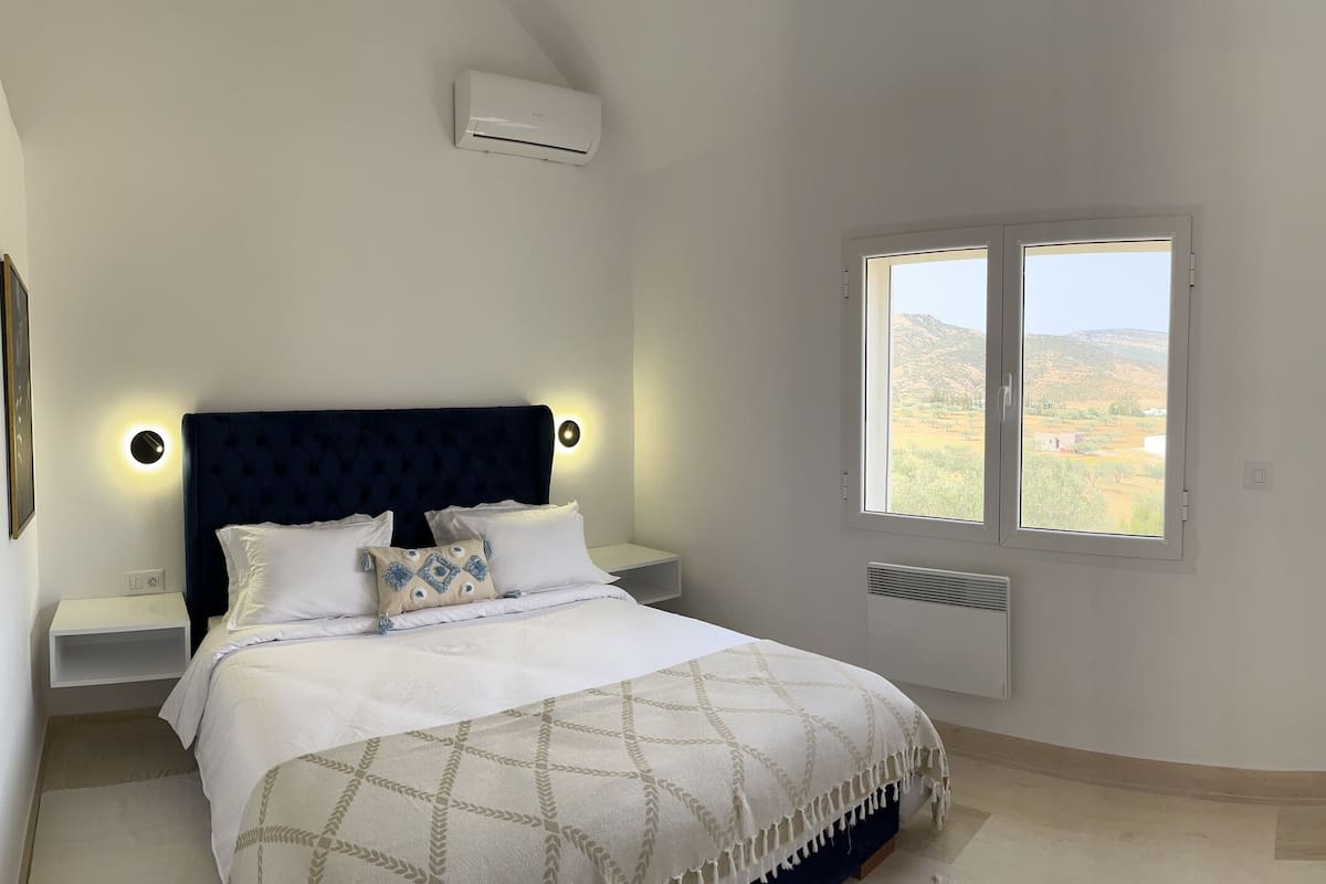 Habitación Deluxe doble, vistas a la montaña | 1 dormitorio, ropa de cama de alta calidad, edredones de plumas