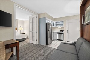 Suite 1 King Bed & Murphy Bed | Living area | 43-inch flat-screen TV with cable channels, Netflix, Hulu