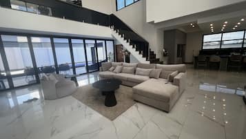 Luxury Villa | Living area | Flat-screen TV