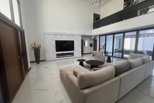 Luxury Villa | Living area | Flat-screen TV