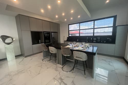 Luxury Villa | Private kitchen | Full-size fridge, microwave, stovetop, electric kettle