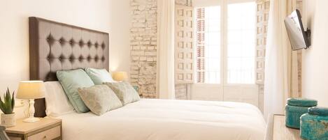 1 dormitorio, tabla de planchar con plancha, Internet y ropa de cama