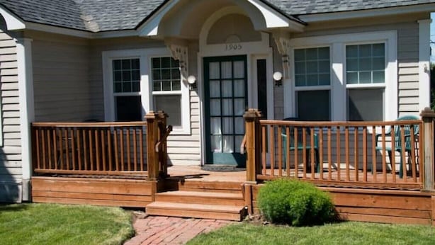 A house with a front porch, a door marked "1905", and a small front yard. - Yakima Vacation Rentals- Spacious Bungalow
 (Yakima)