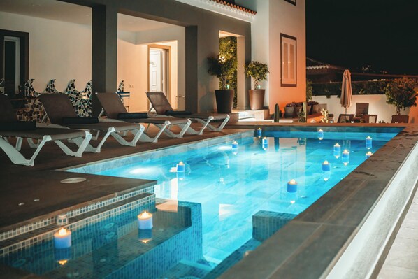 Kolam renang terbuka, kolam dipanaskan 