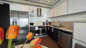 Coffee/tea maker, fridge, microwave, oven - Atlantis Loft Studio by Stay Here PR (San Juan)