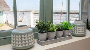 A window sill with three large vases and several potted plants. - The Dairy, Newport - One Bedroom Cottage, Sleeps 2 (Newport)