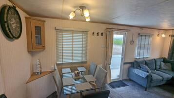 Cabin | Living area | TV, fireplace