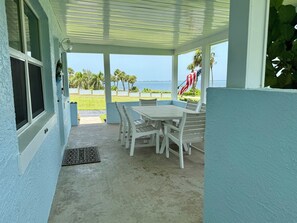 Outdoor dining - Susannah River House located on banks of Indian River Lagoon in The Sunrise City (Fort Pierce)