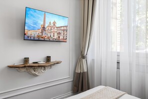 Habitación económica | Ropa de cama de alta calidad y edredones de plumas