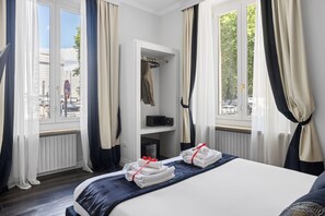 Habitación superior | Ropa de cama de alta calidad y edredones de plumas