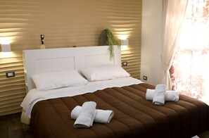 2 quartos, ferros/tábuas de passar roupa, Wi-Fi, roupa de cama