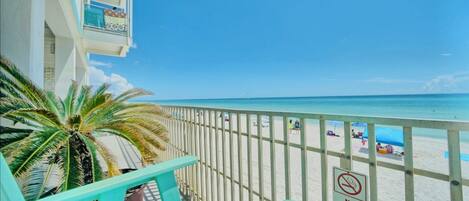 On the beach, sun-loungers, beach towels