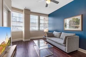 TV - French Quarter Oasis: Stylish 1BR Condo with Rooftop View (New Orleans)