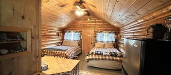 Comfy cabin is situated on the Silver Gate property which overlooks 10,000ft tall mountain peaks surrounding the town.