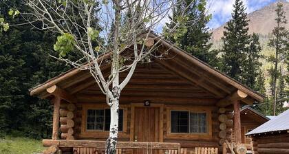 Comfy cabin is situated on the Silver Gate property which overlooks 10,000ft tall mountain peaks surrounding the town.